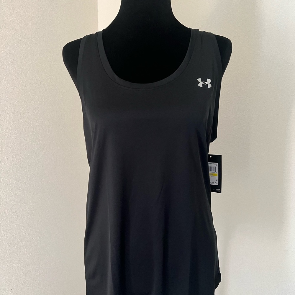 Under Armour women’s loose cut sports tank. All available in L and M. NWT!